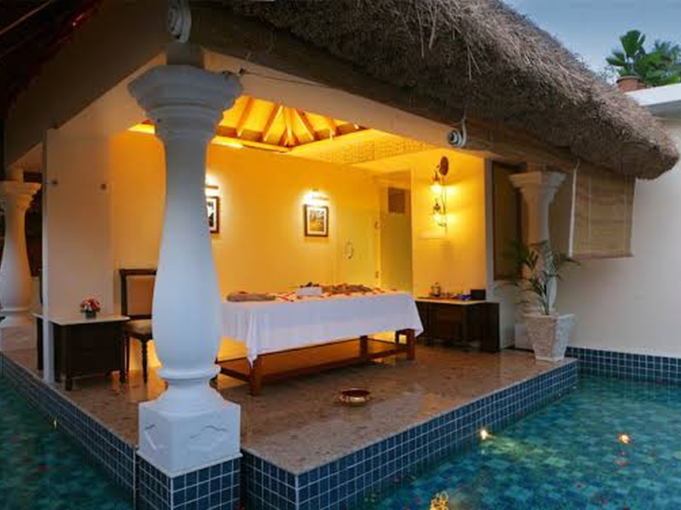 Ayurveda treatment pavilion surrounded by water at Carnoustie