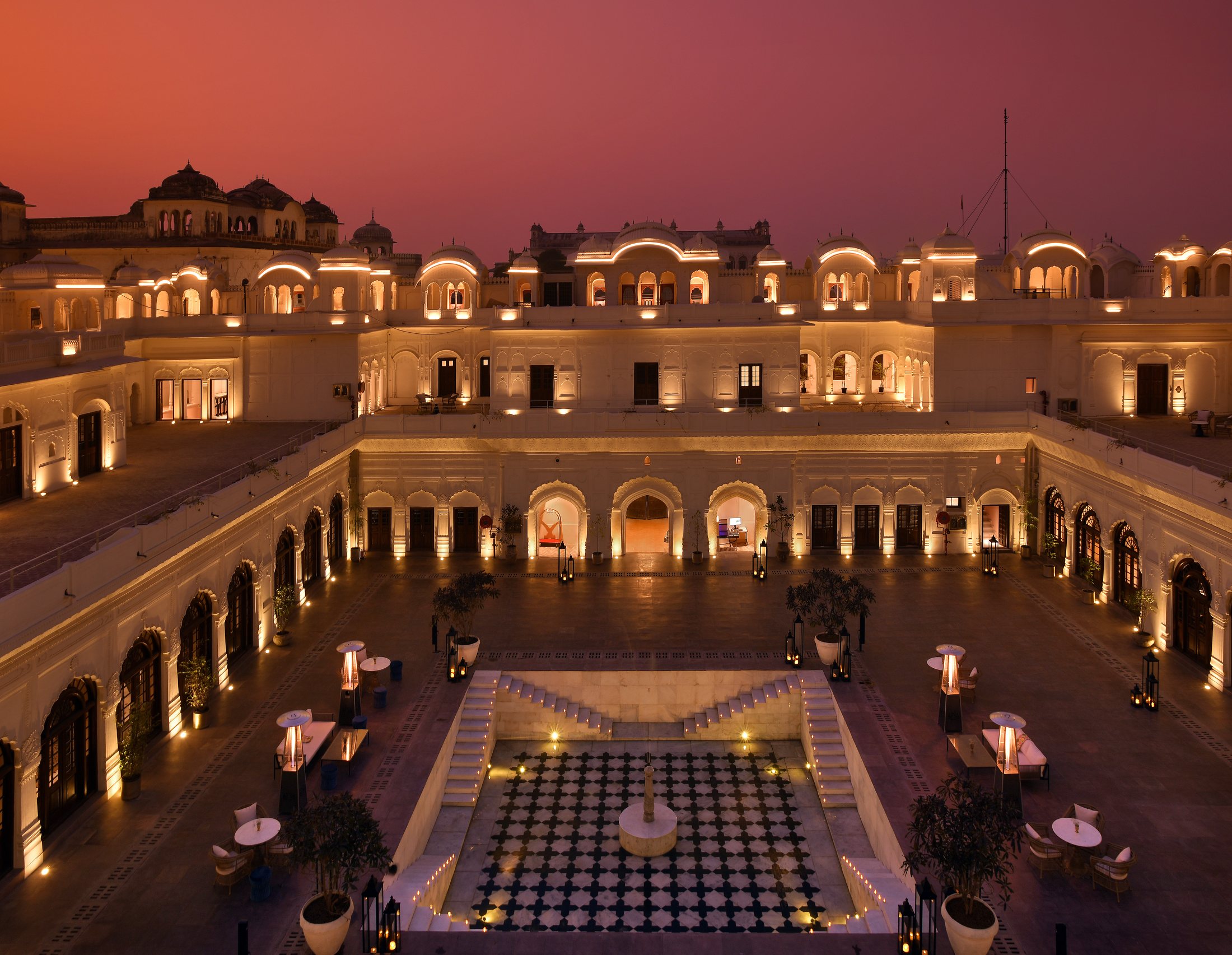 Ranbaas The Palace courtyard lit at dusk