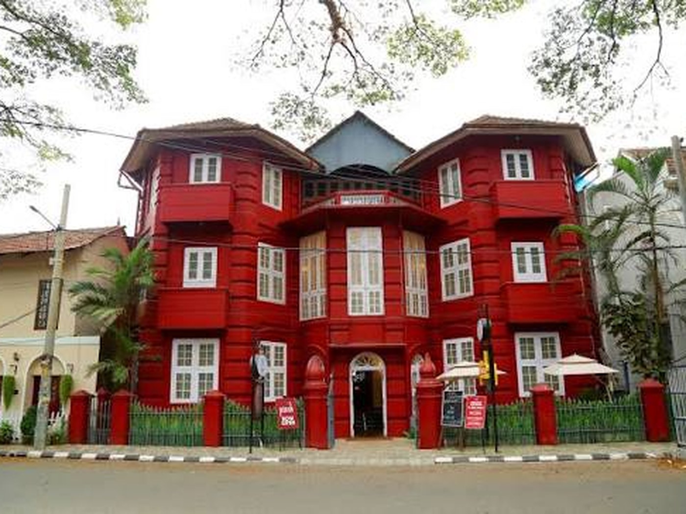 The red facade of Koder House in Fort Kochi