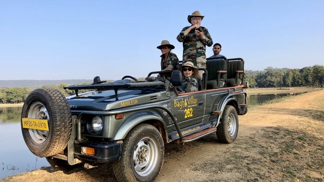 Bagh Villas safari jeep beside the water at Kanha National Park