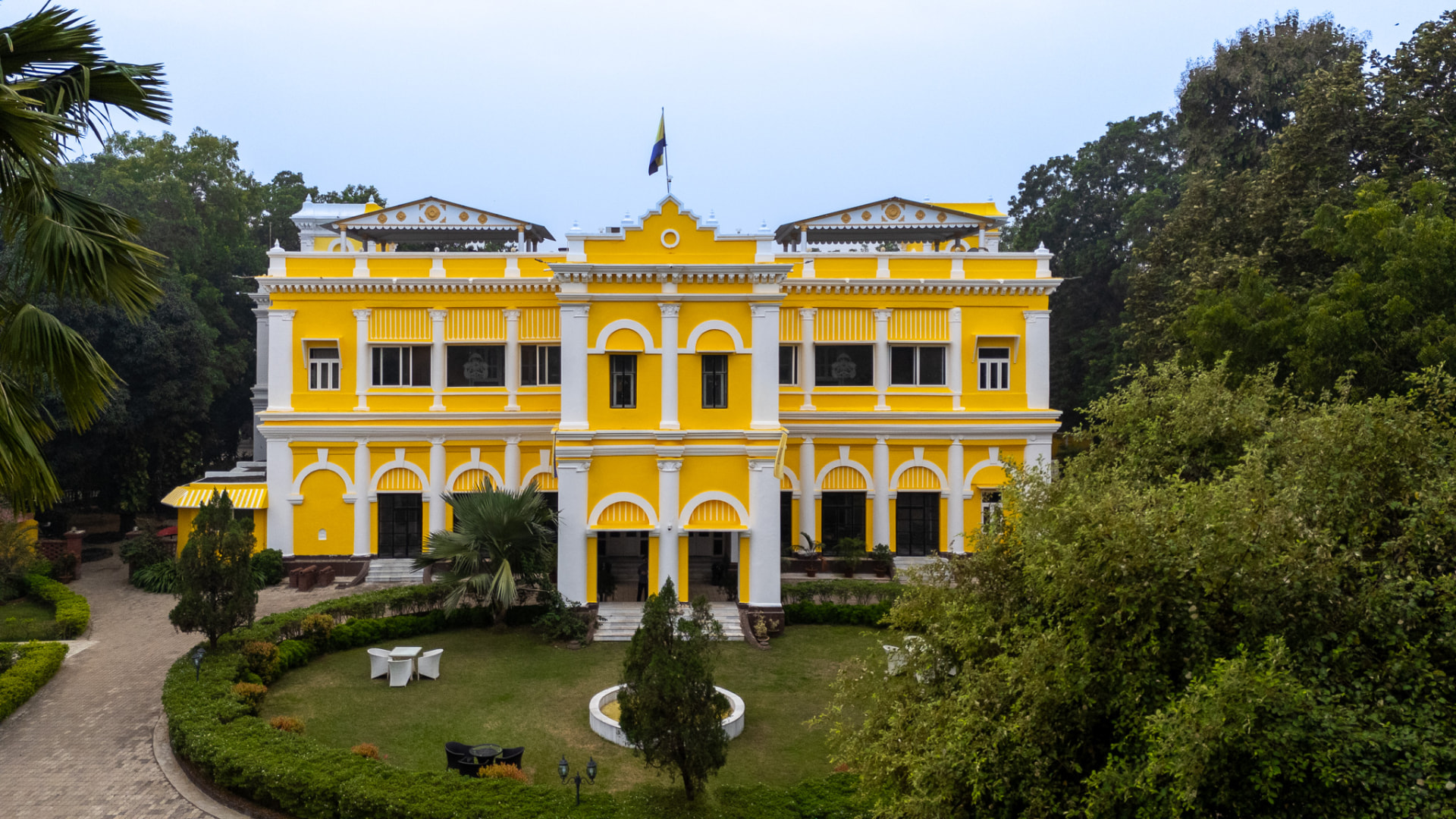 The yellow facade of The Belgadia Palace in Mayurbhanj, Odisha