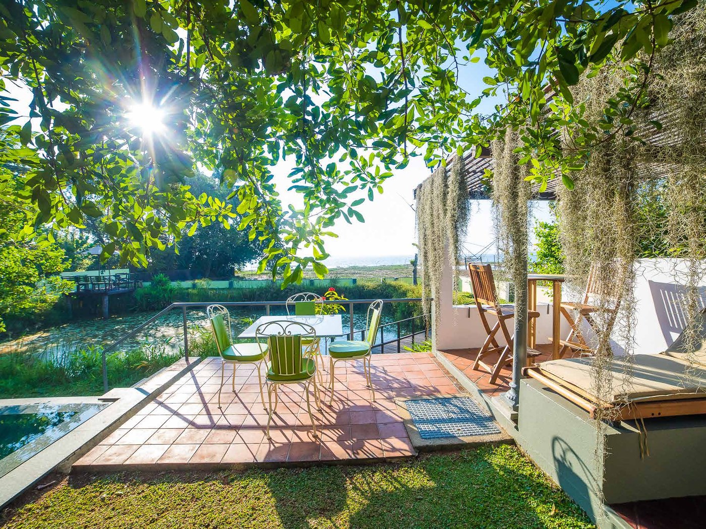 Garden path and solar canopy at Hibiscus Villa