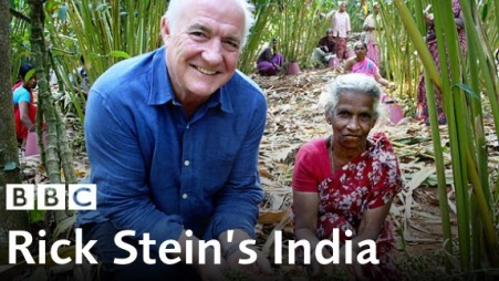 A traveller sharing a home-cooked meal in a Kerala garden kitchen